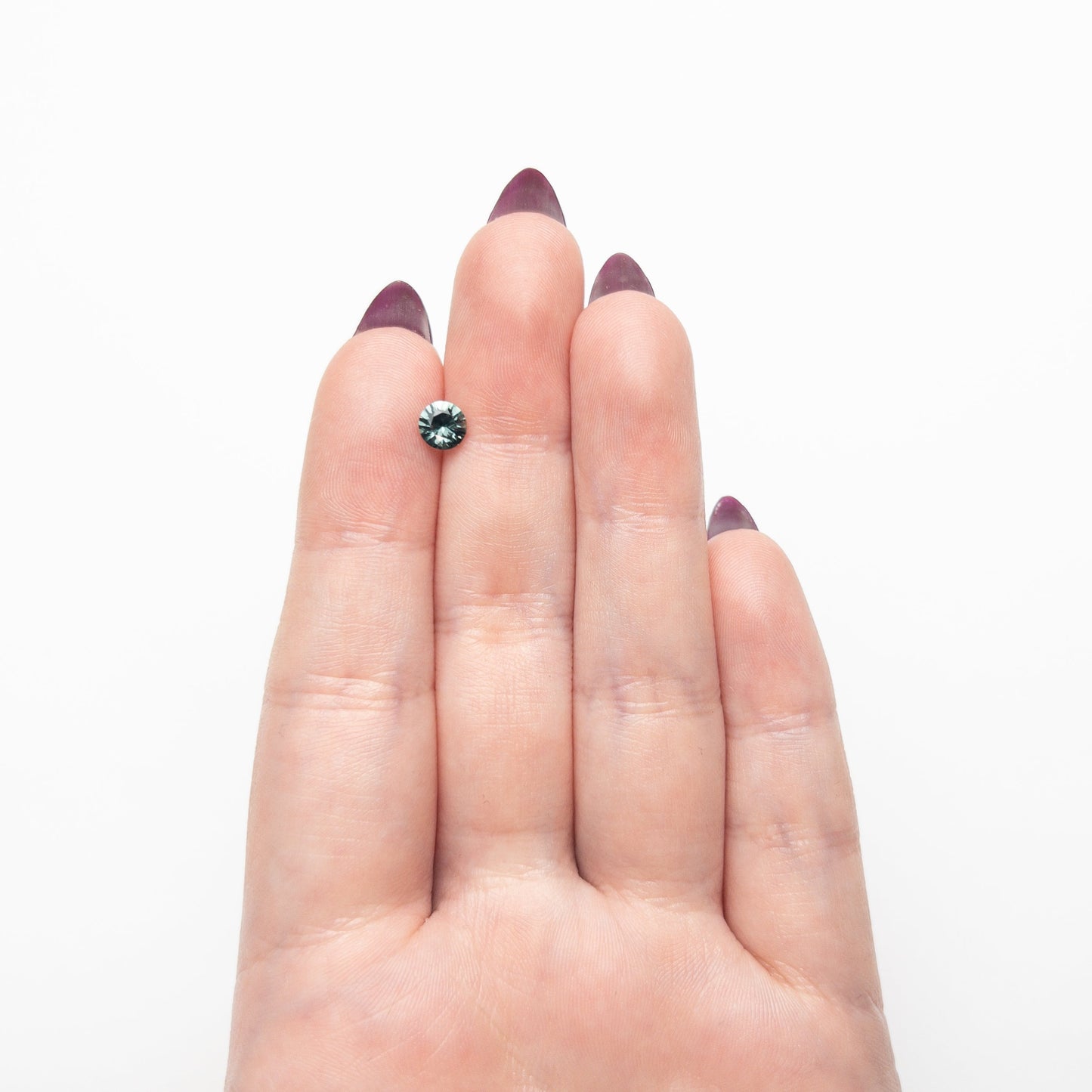 0.70ct 5.40x5.37x3.29mm Round Brilliant Sapphire 26526-09