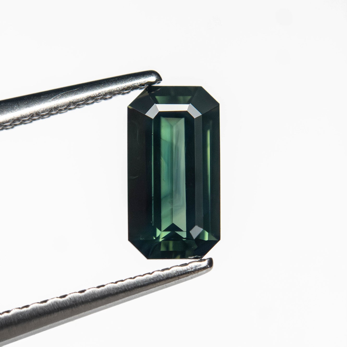 0.99ct 7.89x4.20x2.78mm Cut Corner Rectangle Step Cut Sapphire 27329-05