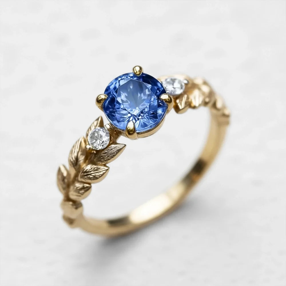 Iris’s Twilight | Round Blue Sapphire Solitaire Engagement Ring