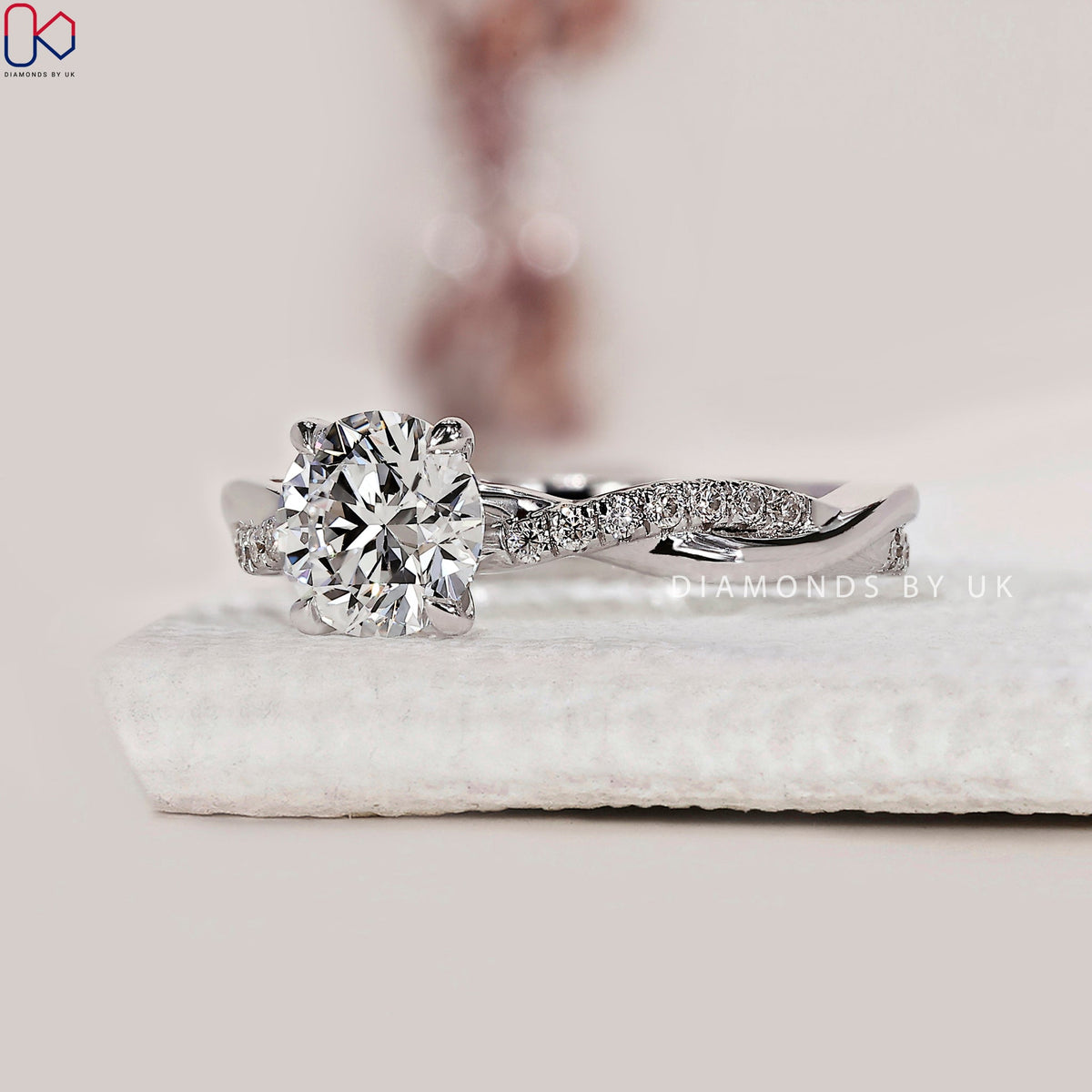 Round Cut Diamond Ring With Twisted Pave Setting