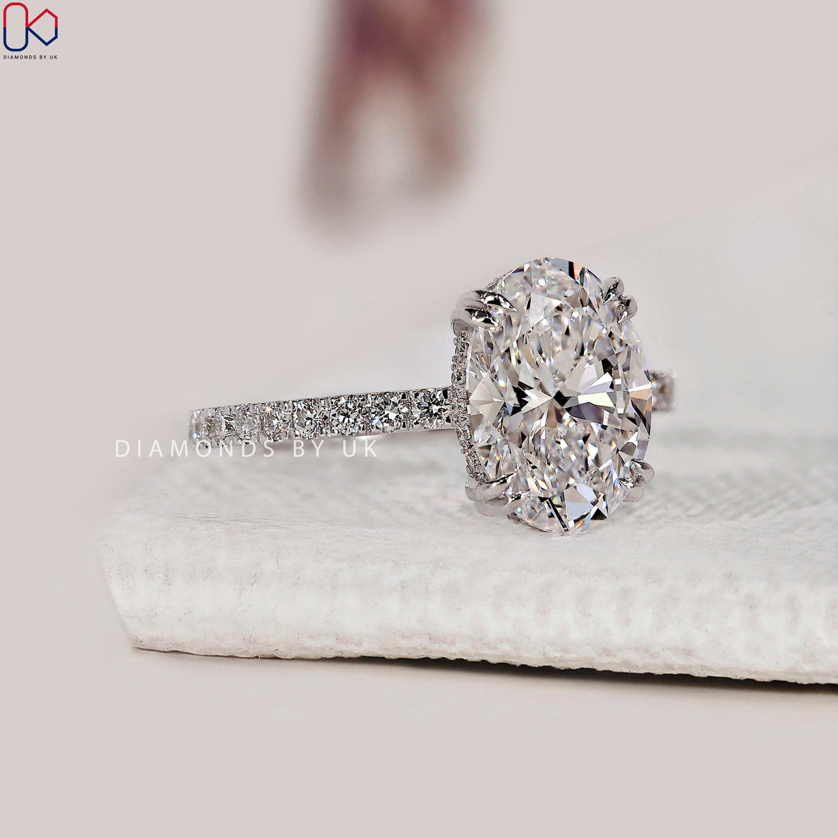 Oval Cut Diamond Ring In Pave Setting
