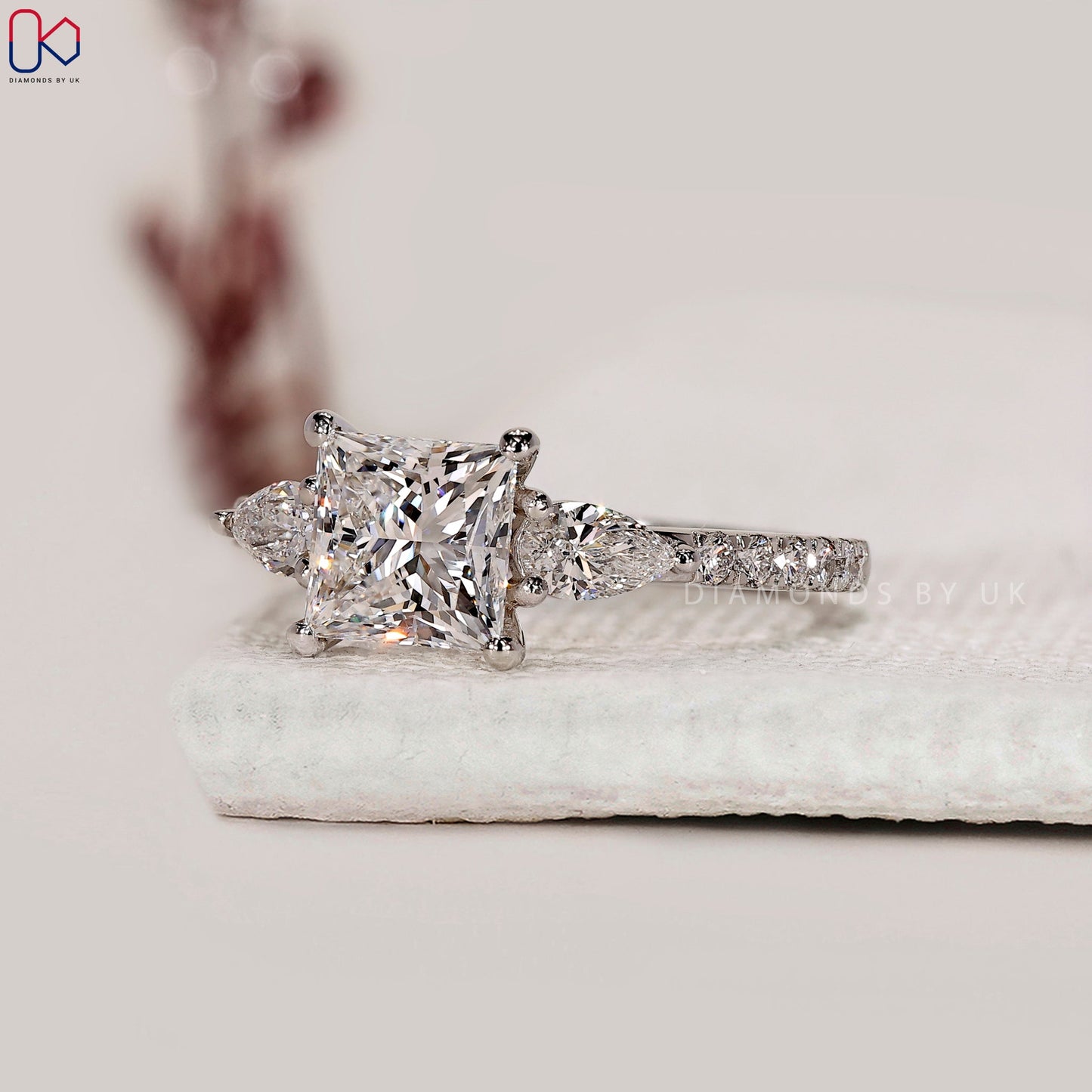 Princess and Pear Cut 3 Stone Ring