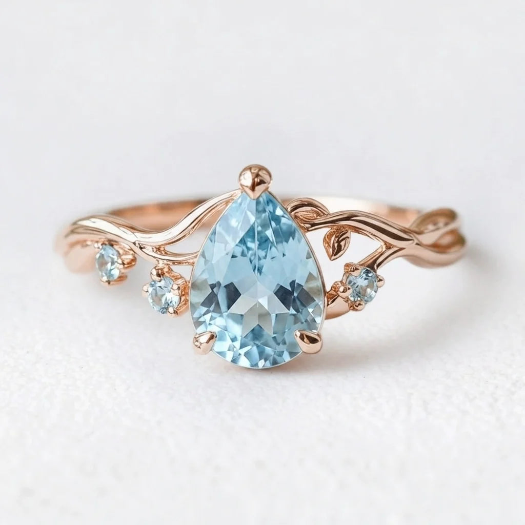 Athena’s Serenity | Pear Cut Blue Aquamarine Engagement Ring