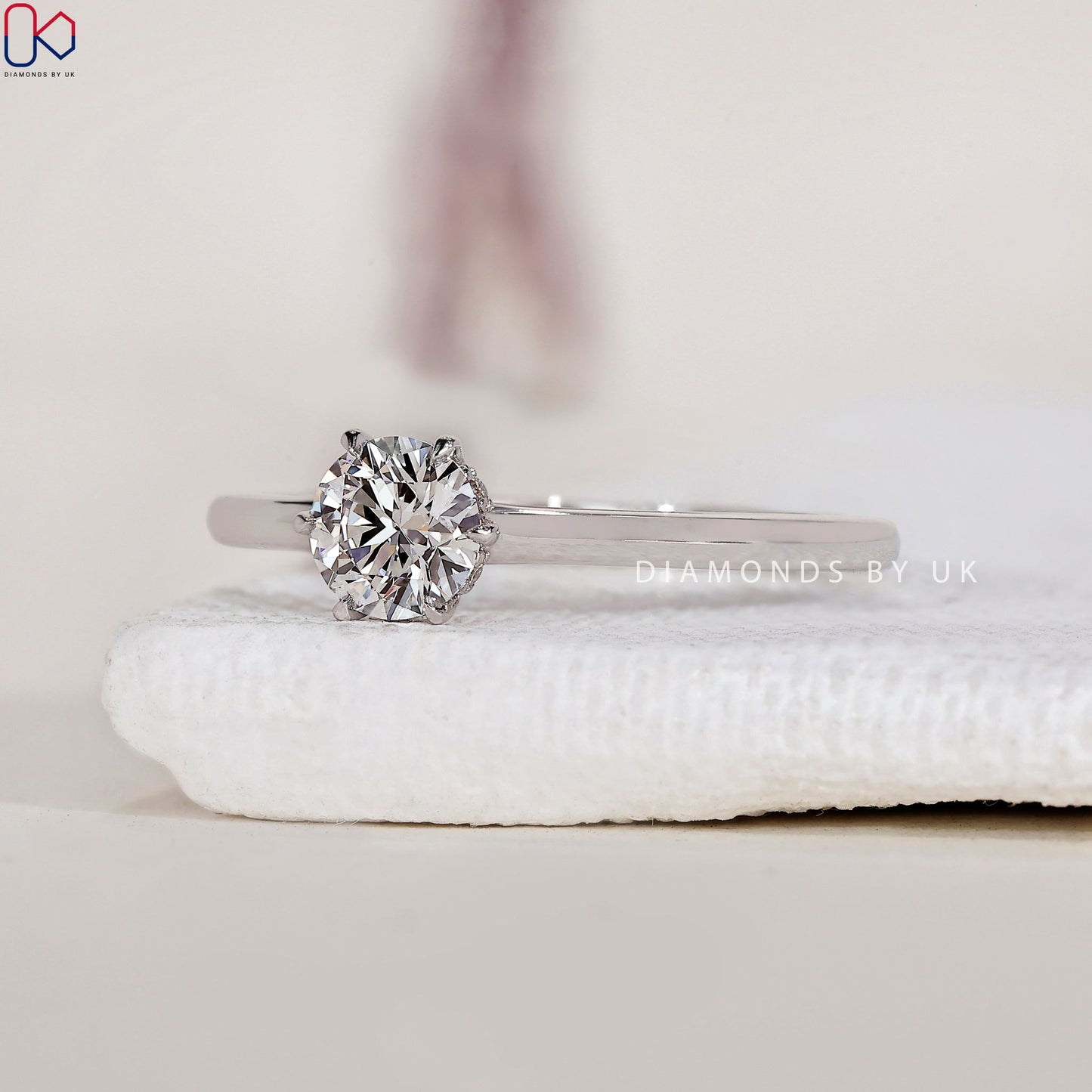 Hidden Halo Round Solitaire Engagement Ring