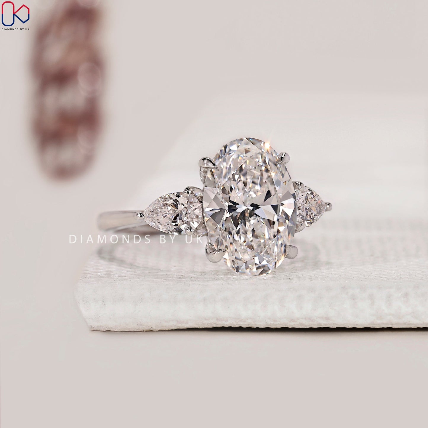 Oval Cut Three Stone Diamond Ring