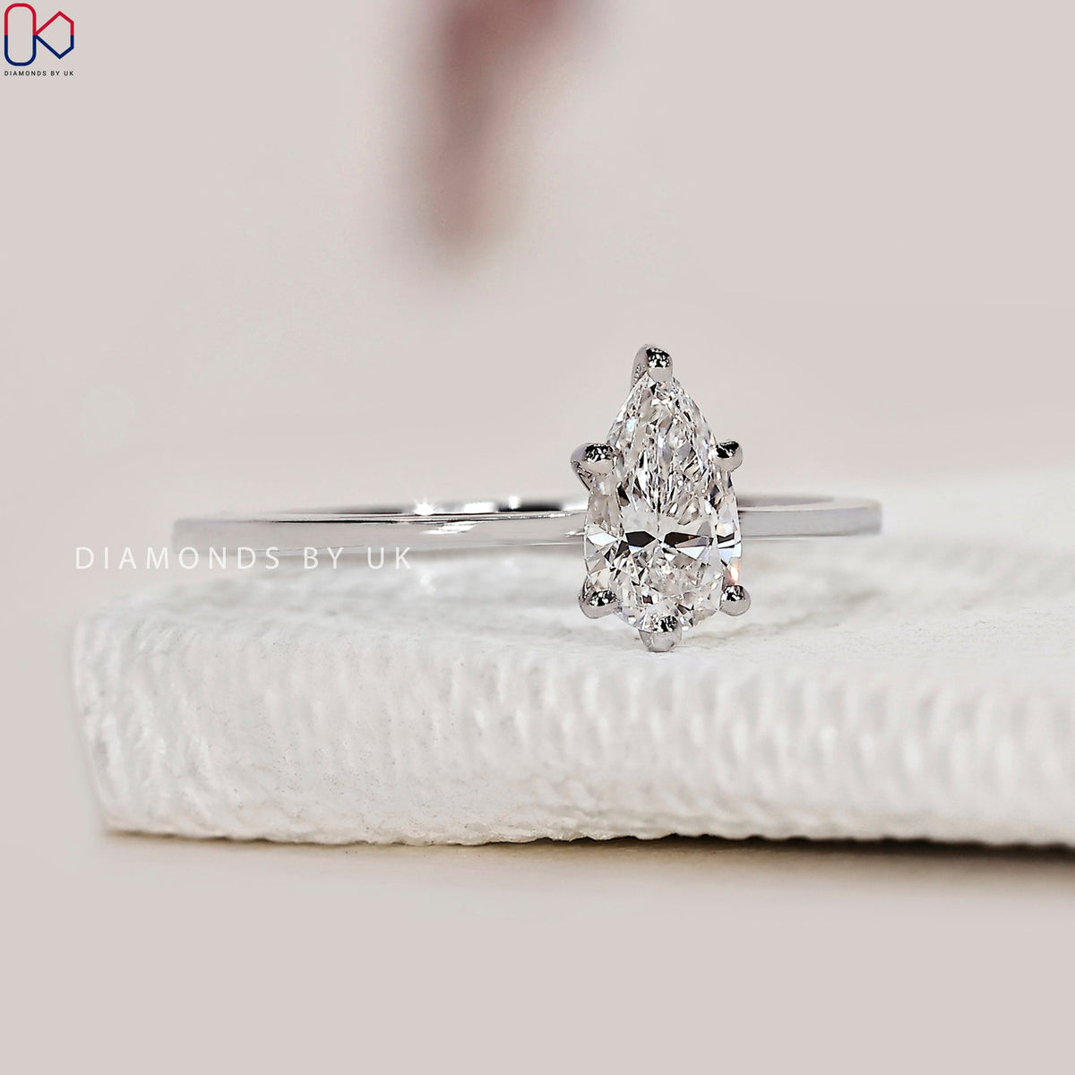 Solitaire Pear Shaped Diamond Ring In White Gold