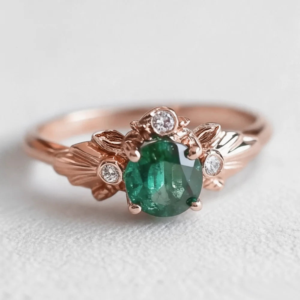 Eve’s Laurel | Natural Emerald Engagement Ring with Diamond Leaf Setting