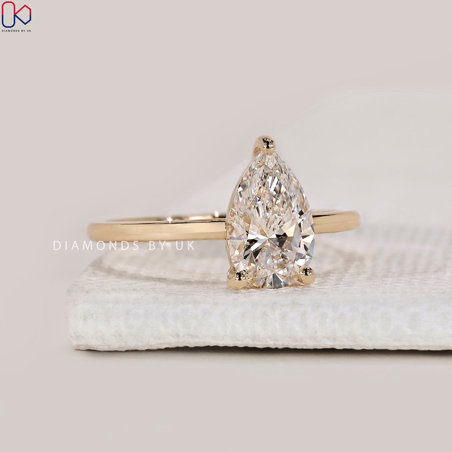 Yellow Gold Pear Solitaire Engagement Ring