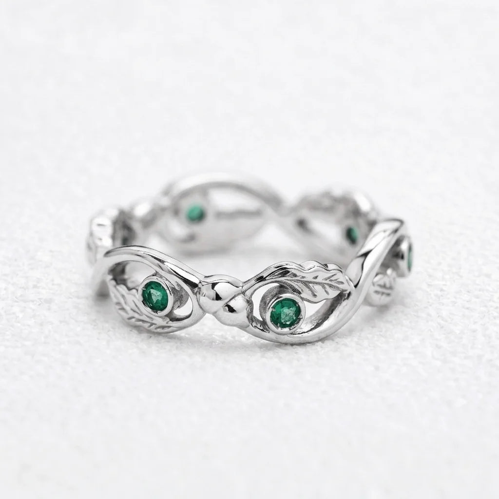 The Lacy Oak | Openwork Oak Leaves & Natural Emerald Women's Wedding Band