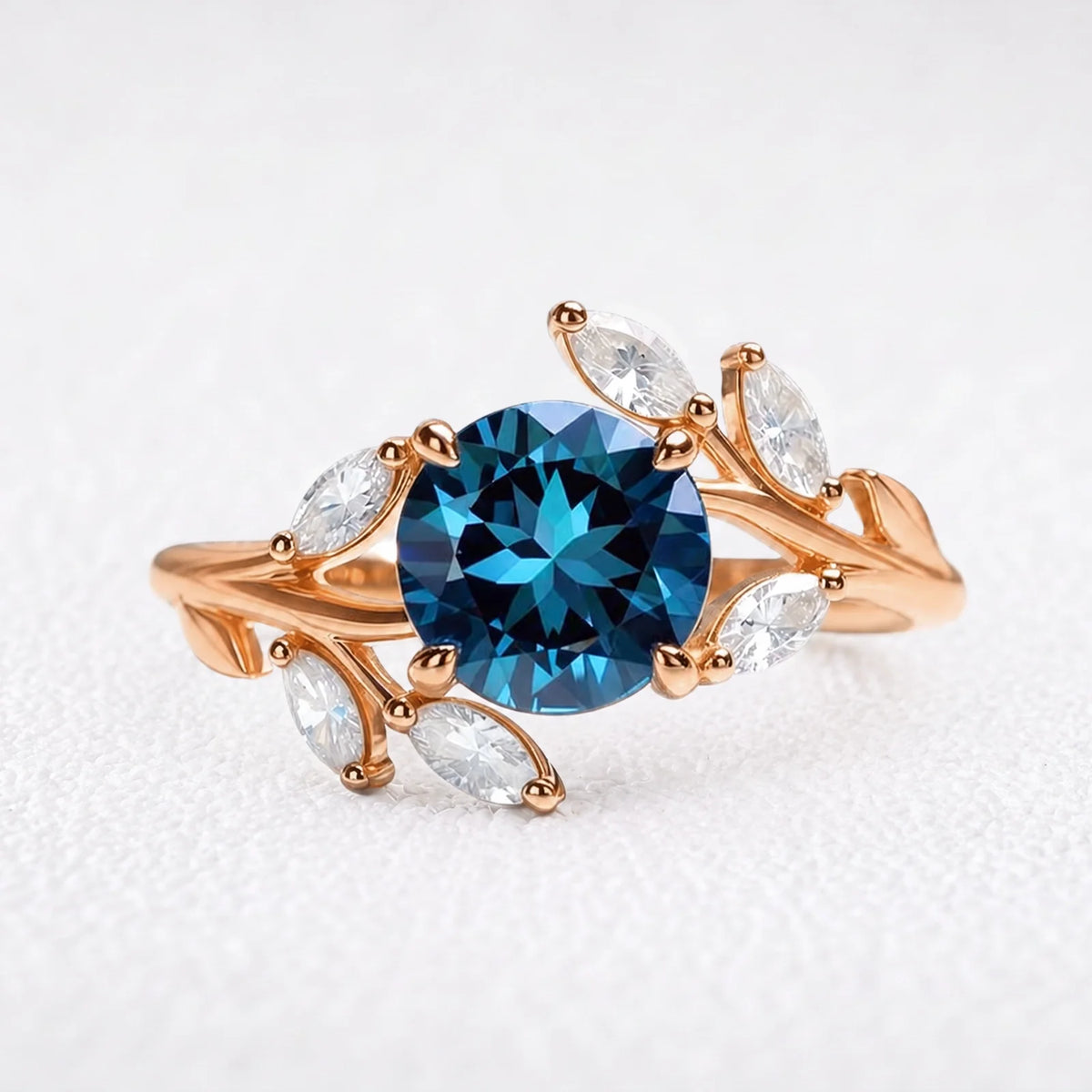 Eleonora’s Radiance | Round Blue Sapphire Vine Engagement Ring