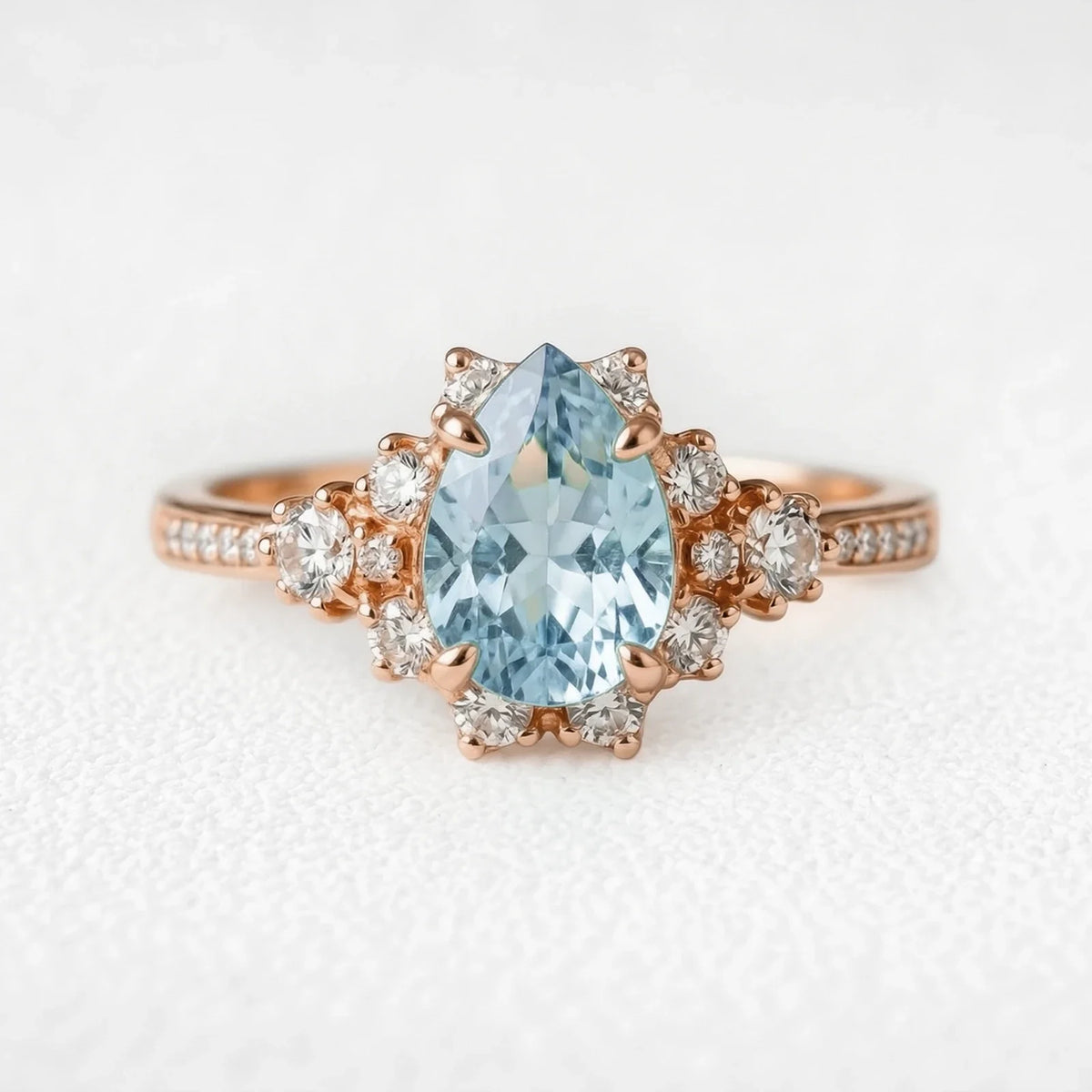 Cora‘s Lagoon | Pear Cut Aquamarine Halo Engagement Ring