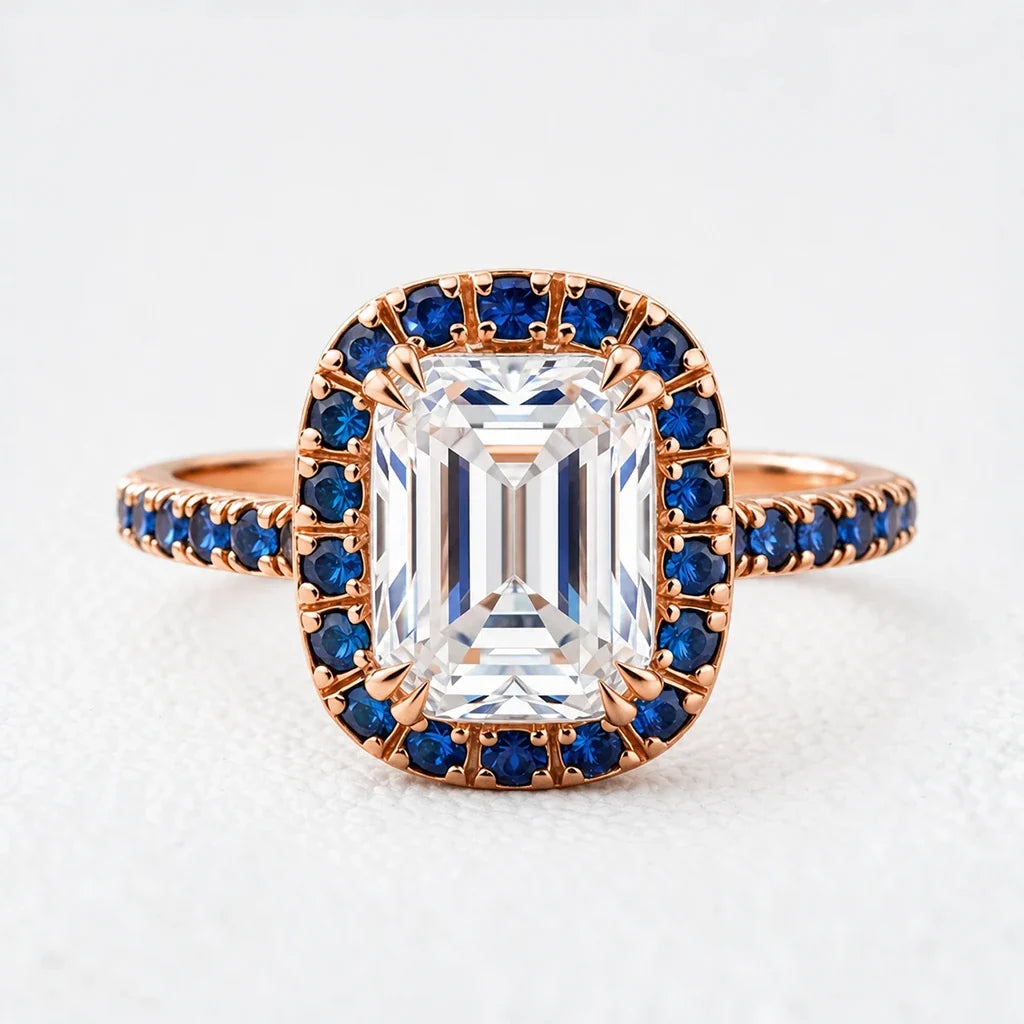 Aurora’s Luminary | 2CT Emerald Cut Diamond Sapphire Halo & Pavé Ring