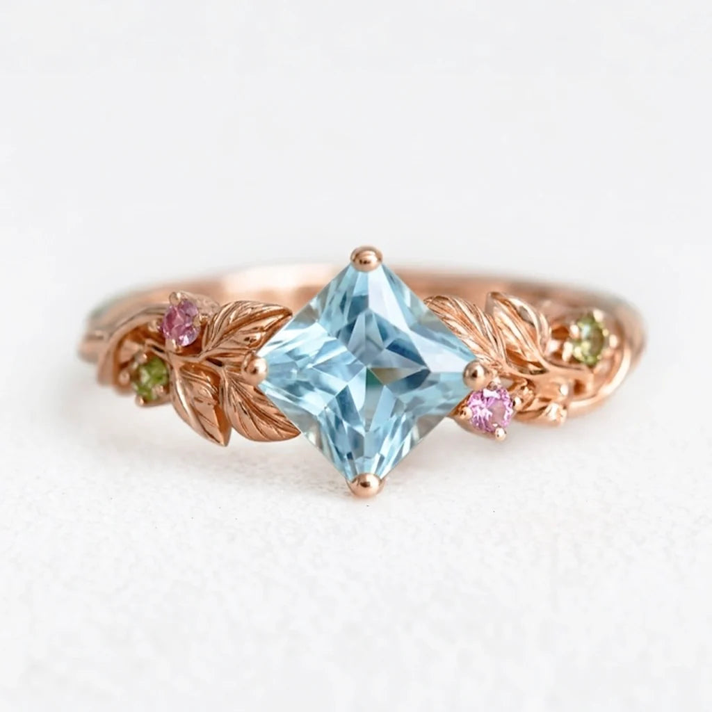 Cressida’s Stillness | Clear Blue Aquamarine Leafy Engagement Ring