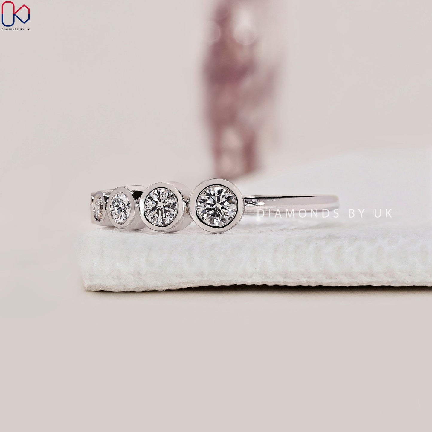 Round Cut White Gold Bezel Set Wedding Band