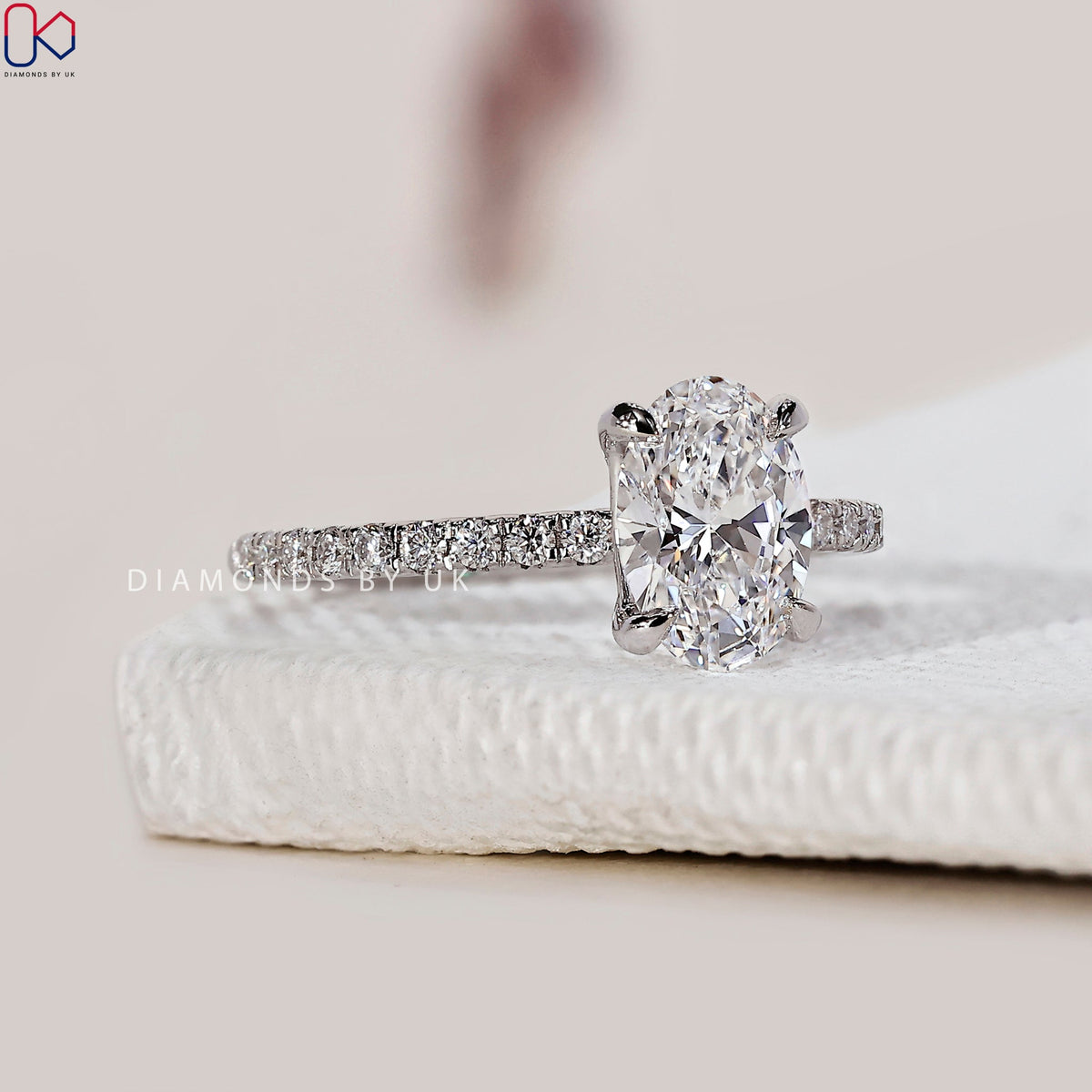 Oval Shaped Engagement Ring With Pave Setting
