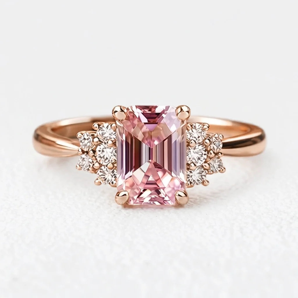 Aurora’s Promise | 2CT Emerald Cut Pink Sapphire Engagement Ring
