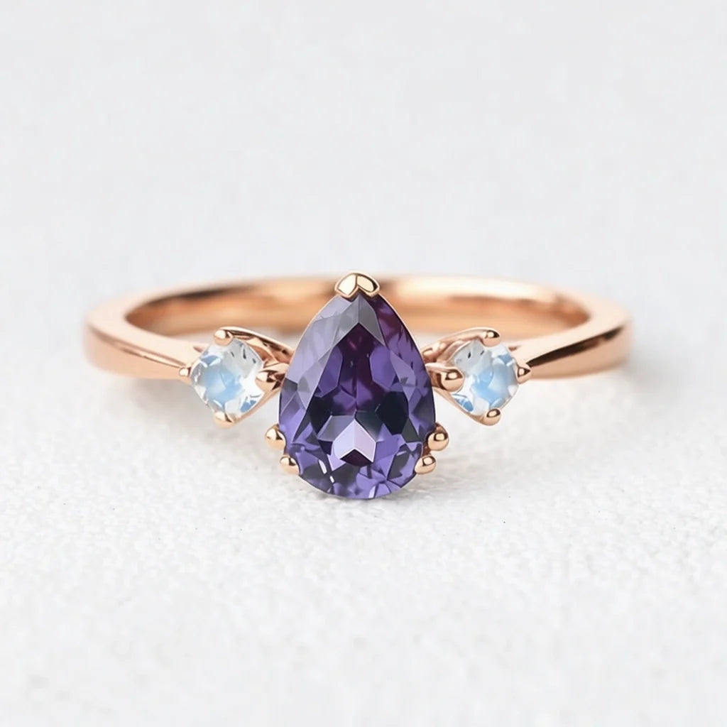 Selene’s Mirage | Pear Tanzanite & Moonstone Engagement Ring