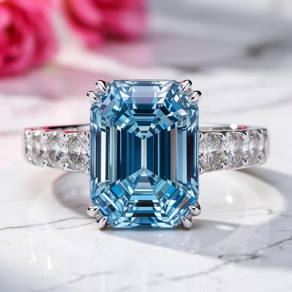 Marina’s Epoch | 3CT Emerald Cut Blue Sapphire Solitaire Engagement Ring