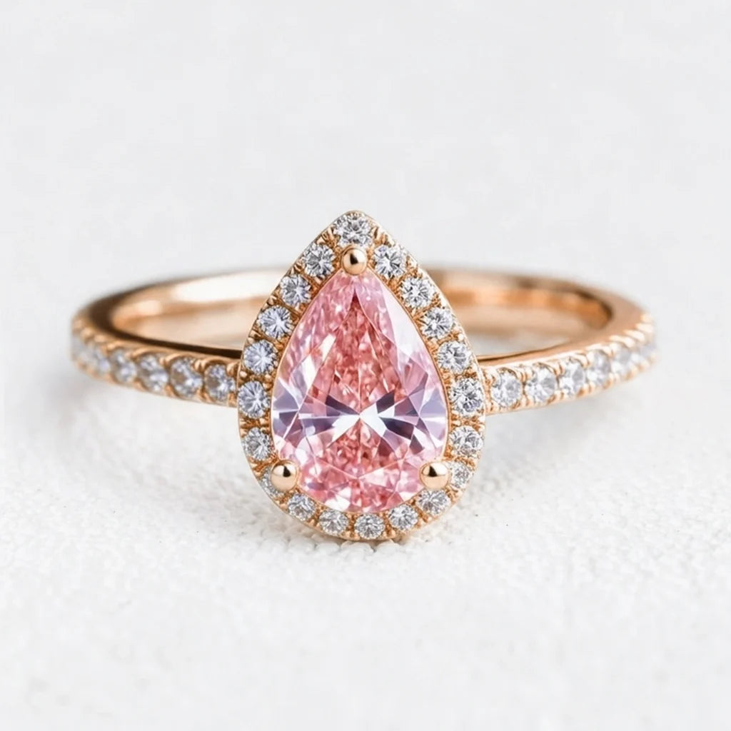 Stella’s Spark | 3CT Pear Cut Pink Sapphire Engagement Ring