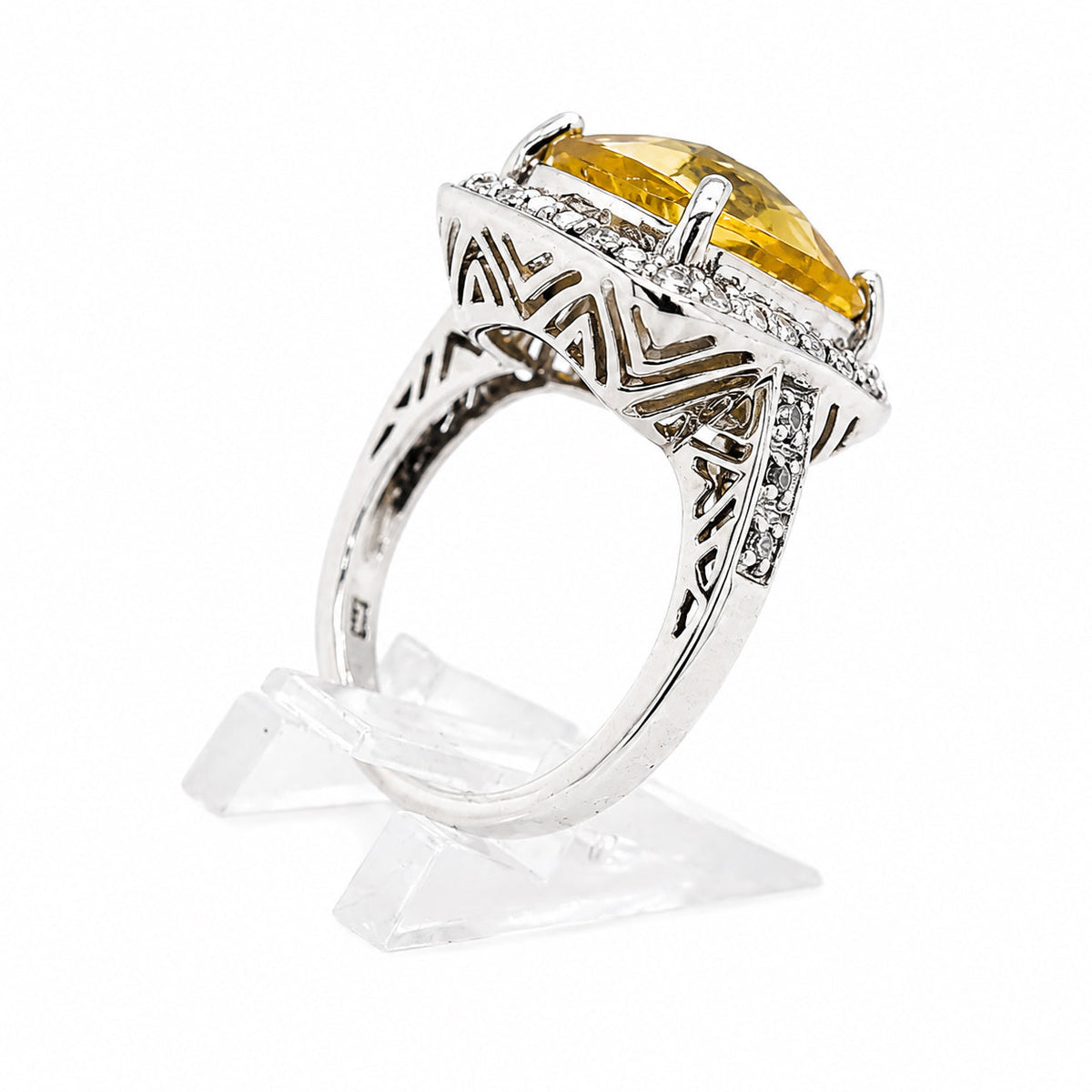 SS Ring with facated orange-yellow stone