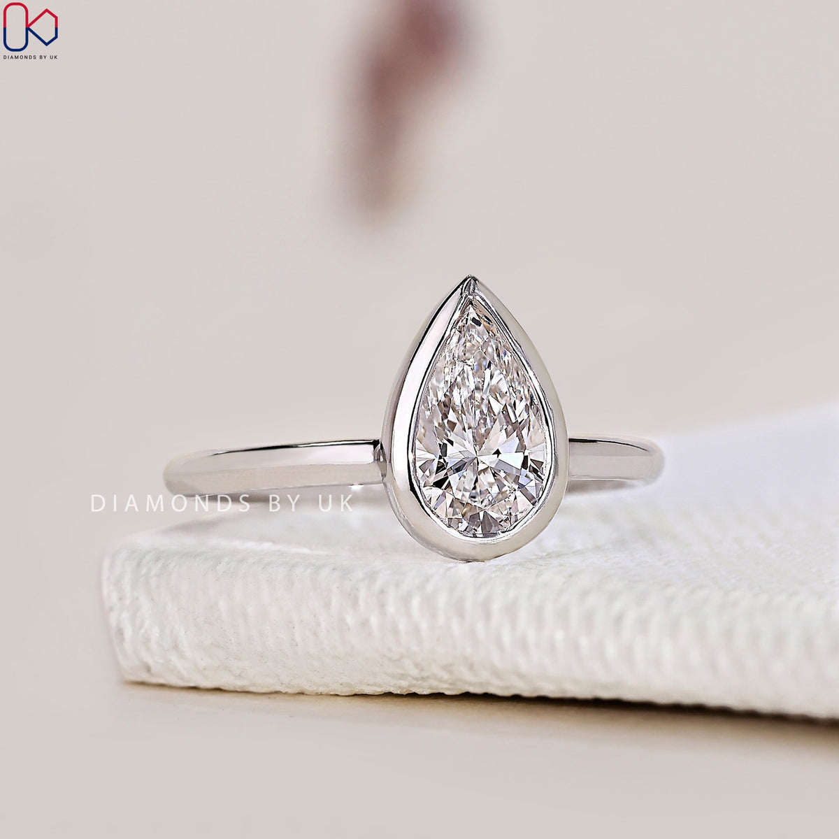 Bezel Setting Pear Cut Diamond Engagement Ring