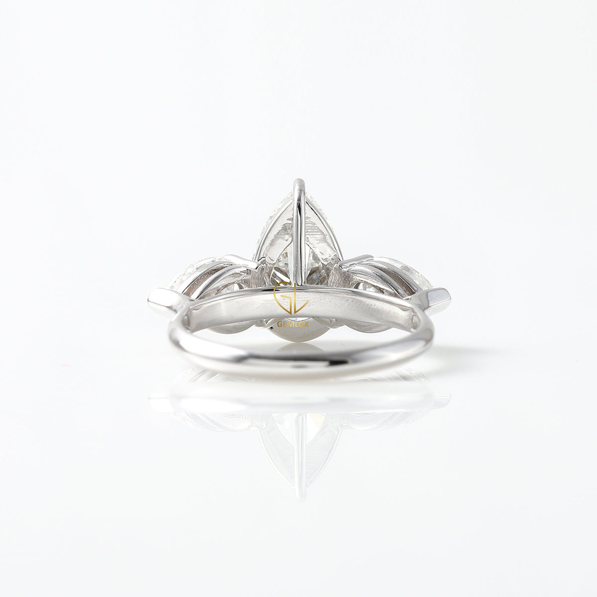 3 Ct Pear Cut Lab Grown Diamond Three Stone Ring