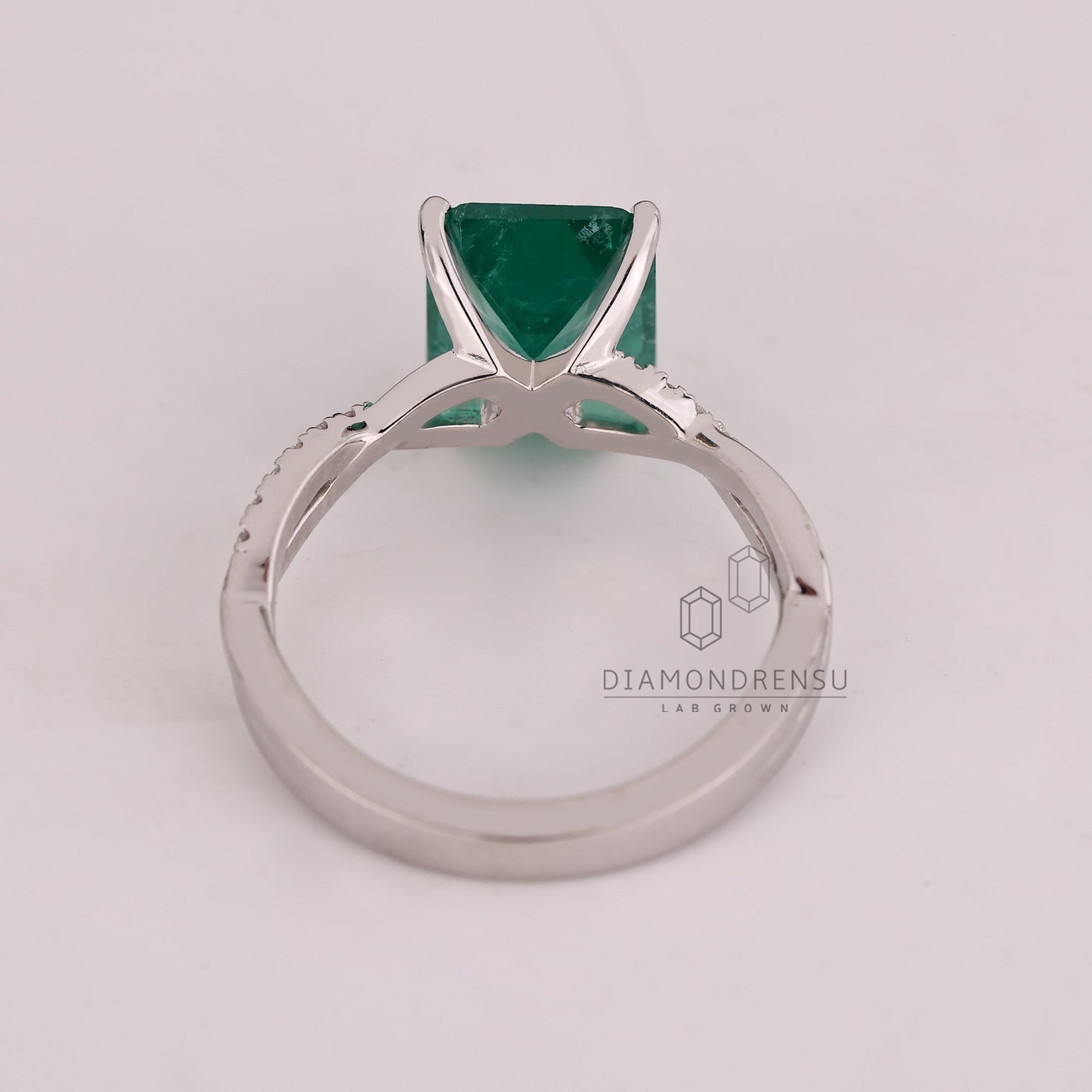 Green Emerald Birthstone Ring with twisted Shank Pave Setting
