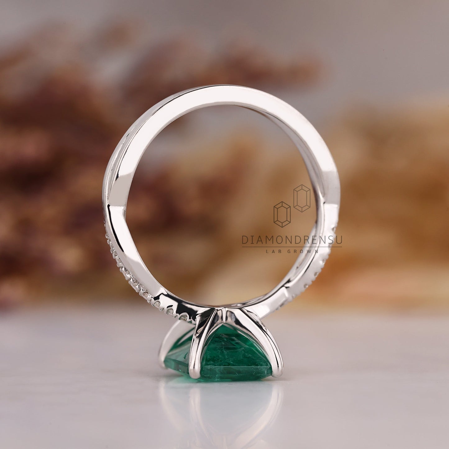 Green Emerald Birthstone Ring with twisted Shank Pave Setting