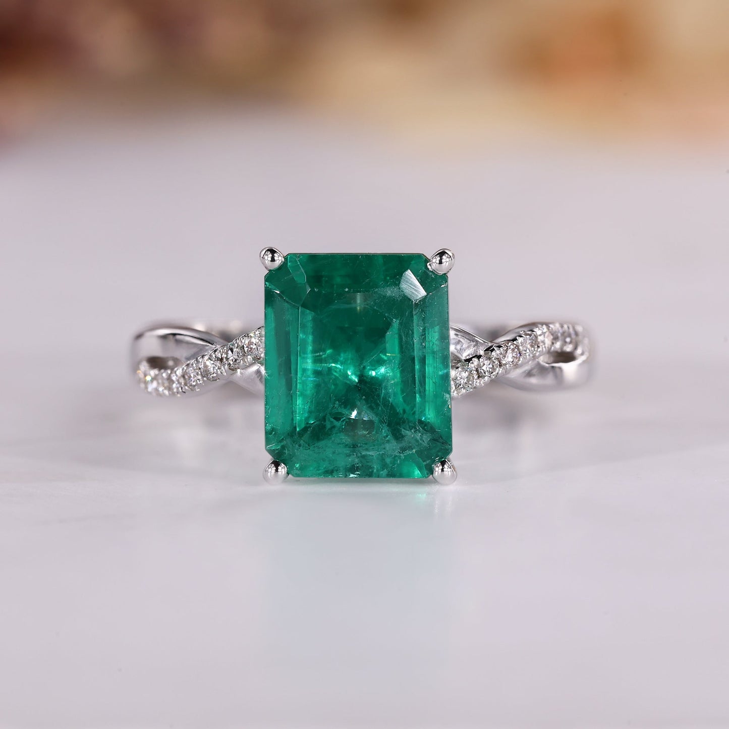 Green Emerald Birthstone Ring with twisted Shank Pave Setting