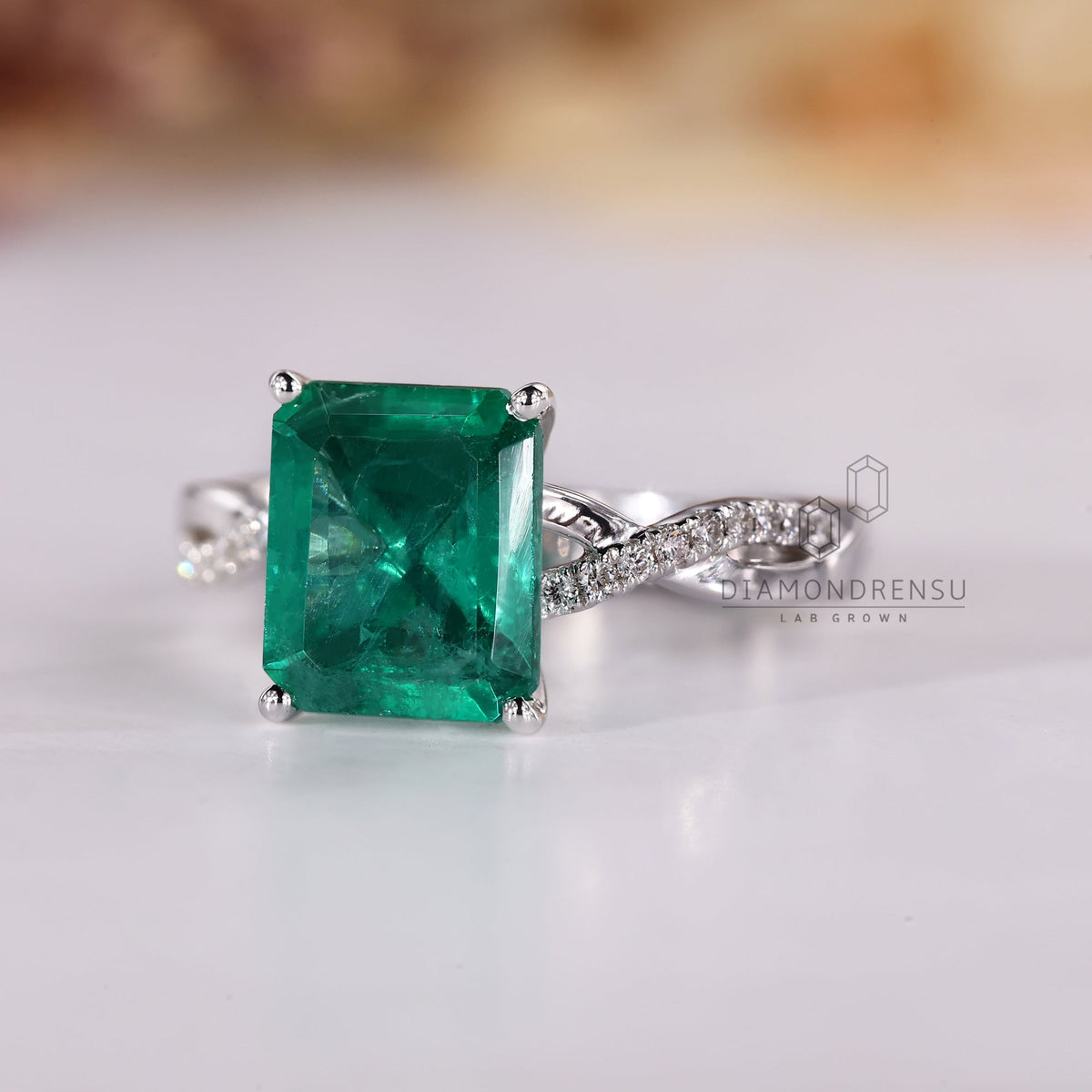 Green Emerald Birthstone Ring with twisted Shank Pave Setting