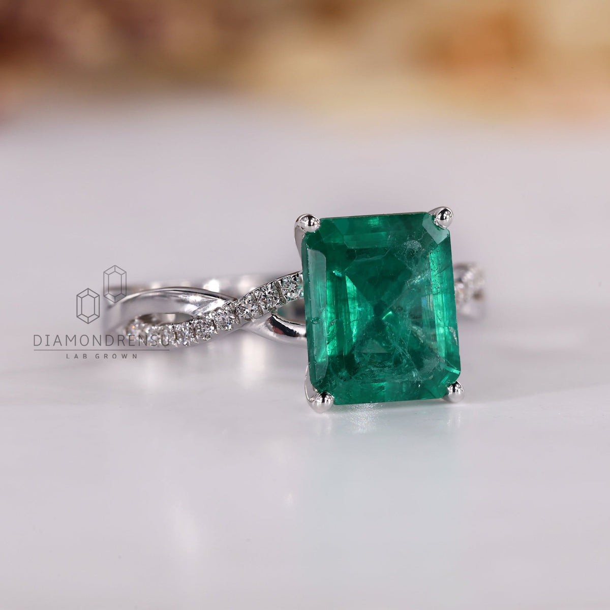 Green Emerald Birthstone Ring with twisted Shank Pave Setting