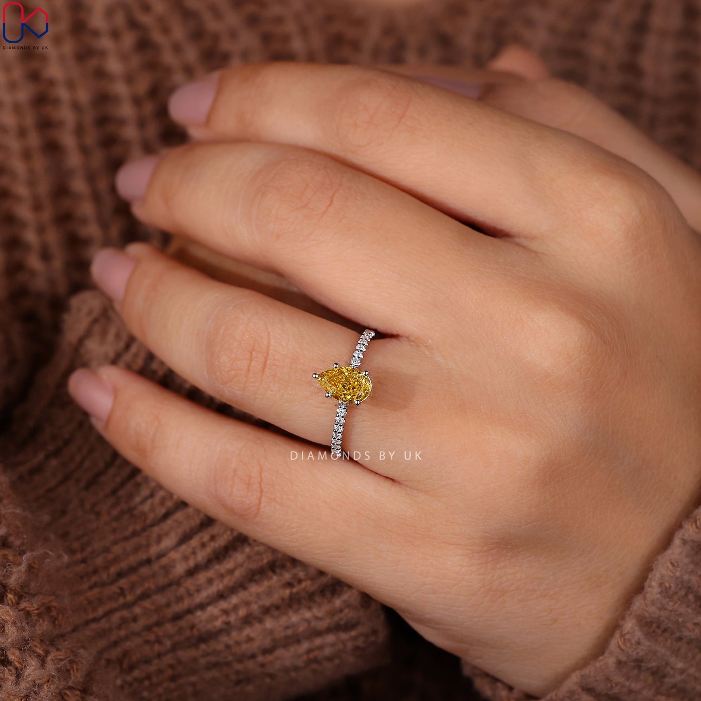 Pear Cut Yellow Diamond Ring