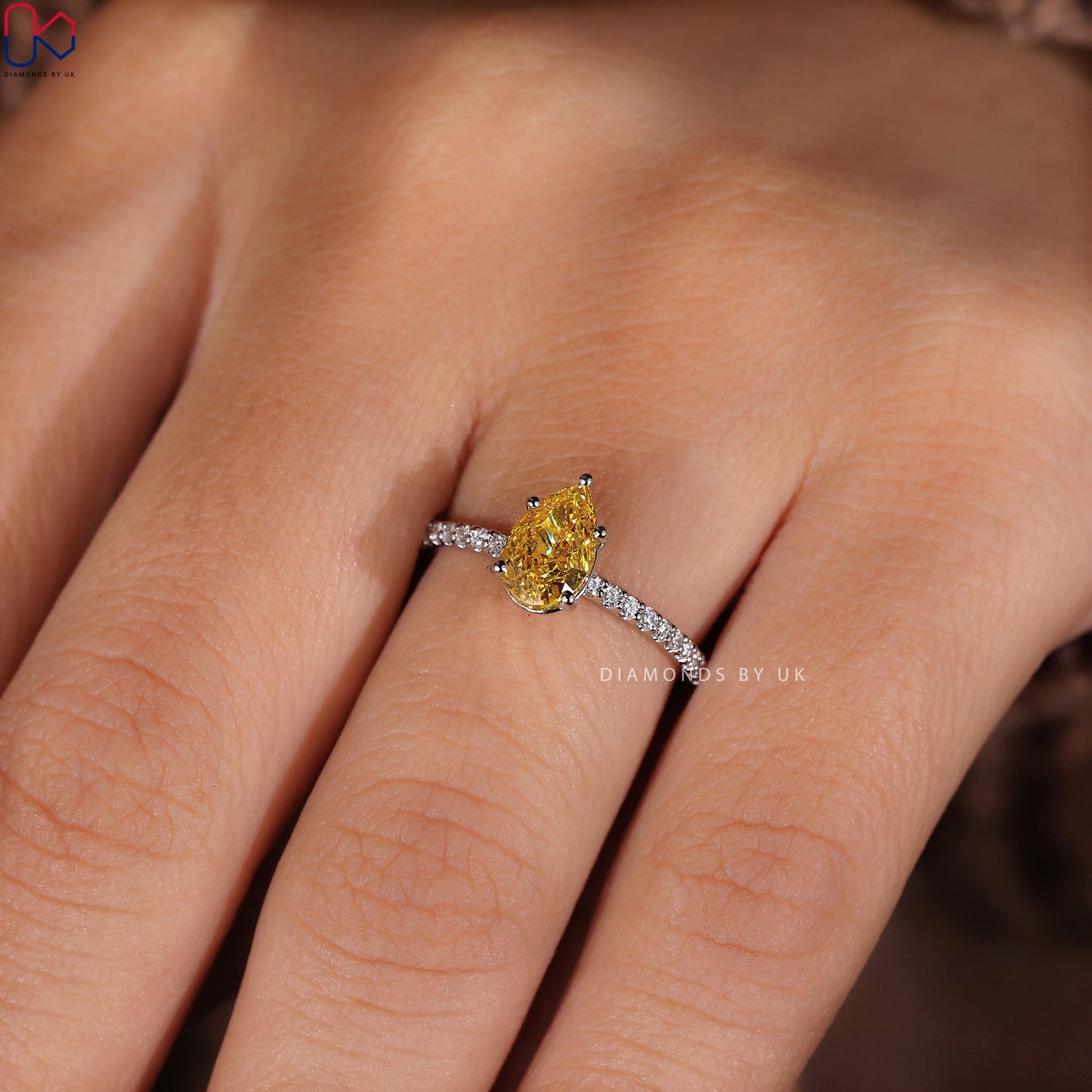 Pear Cut Yellow Diamond Ring