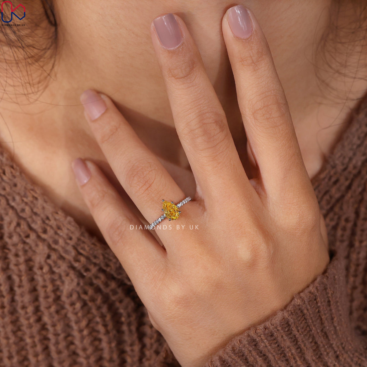 Pear Cut Yellow Diamond Ring