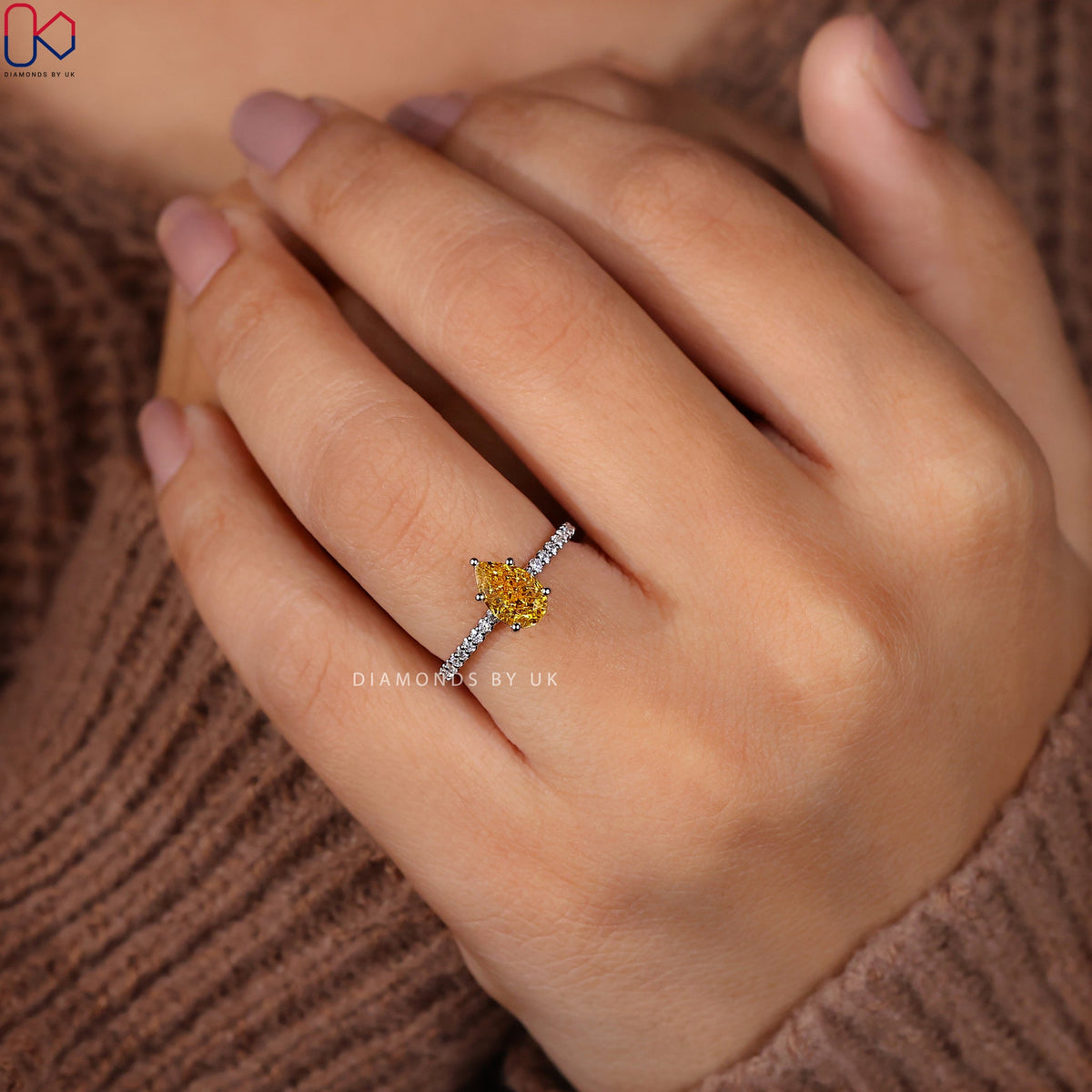 Pear Cut Yellow Diamond Ring