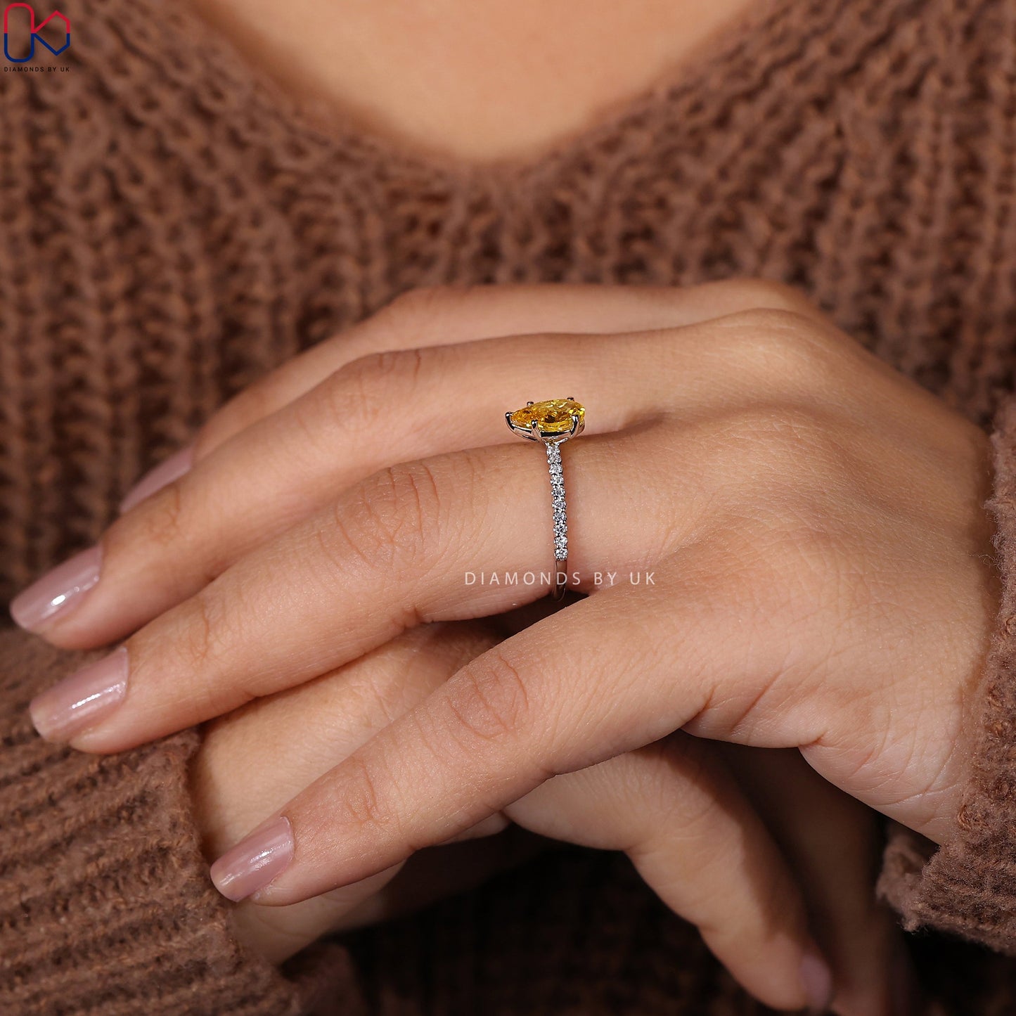 Pear Cut Yellow Diamond Ring