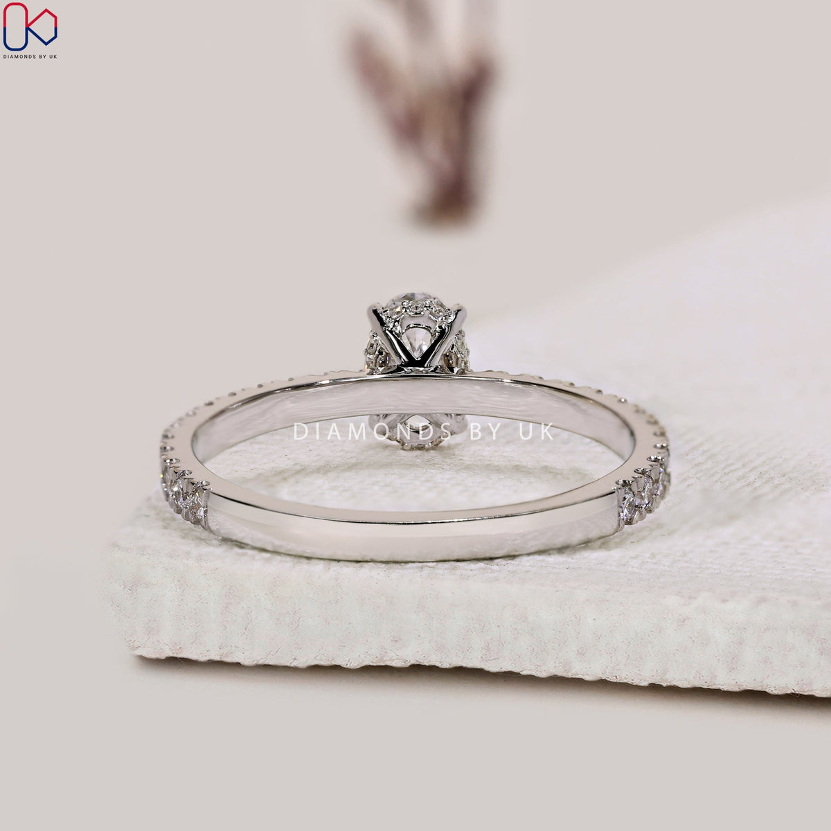 Gold Oval Diamond Engagement Ring In Pave Setting