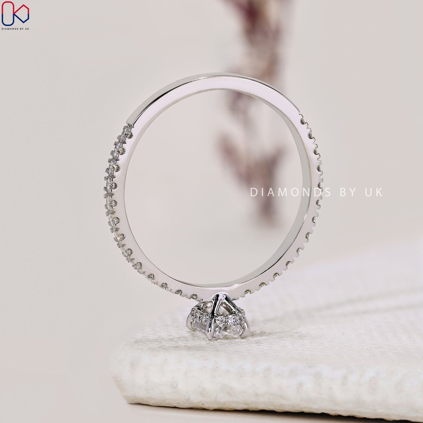 Gold Oval Diamond Engagement Ring In Pave Setting