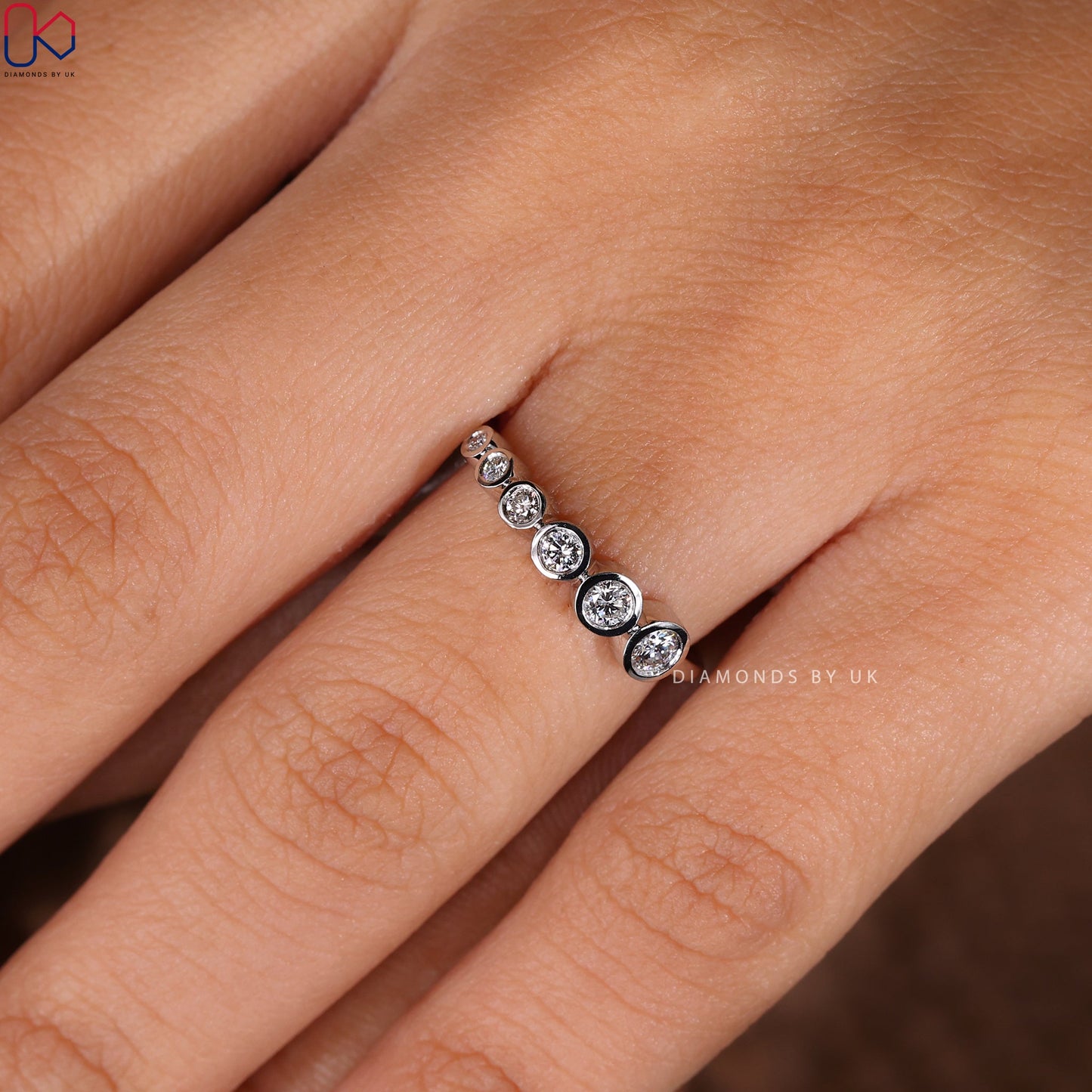 Round Cut White Gold Bezel Set Wedding Band