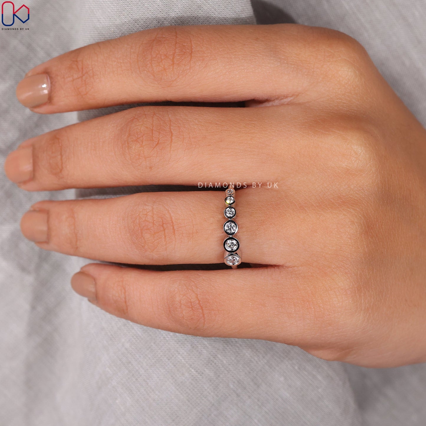 Round Cut White Gold Bezel Set Wedding Band