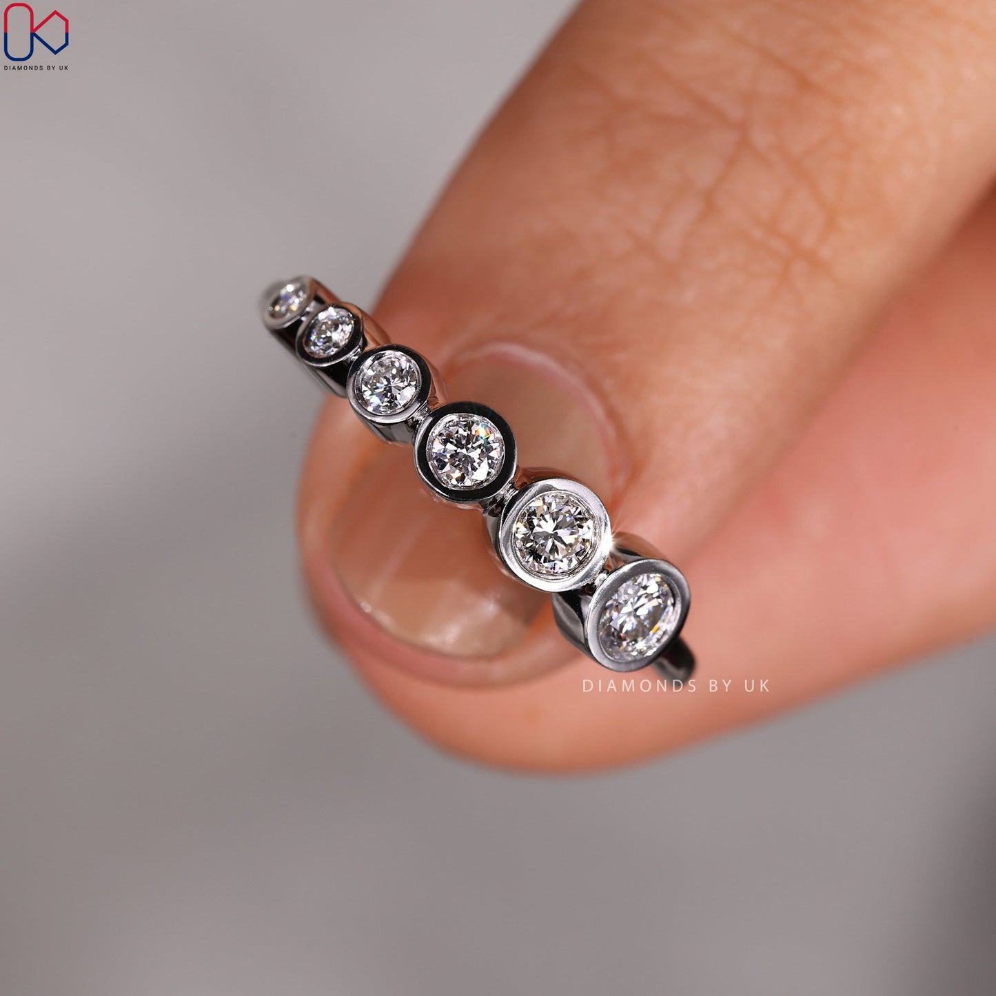 Round Cut White Gold Bezel Set Wedding Band