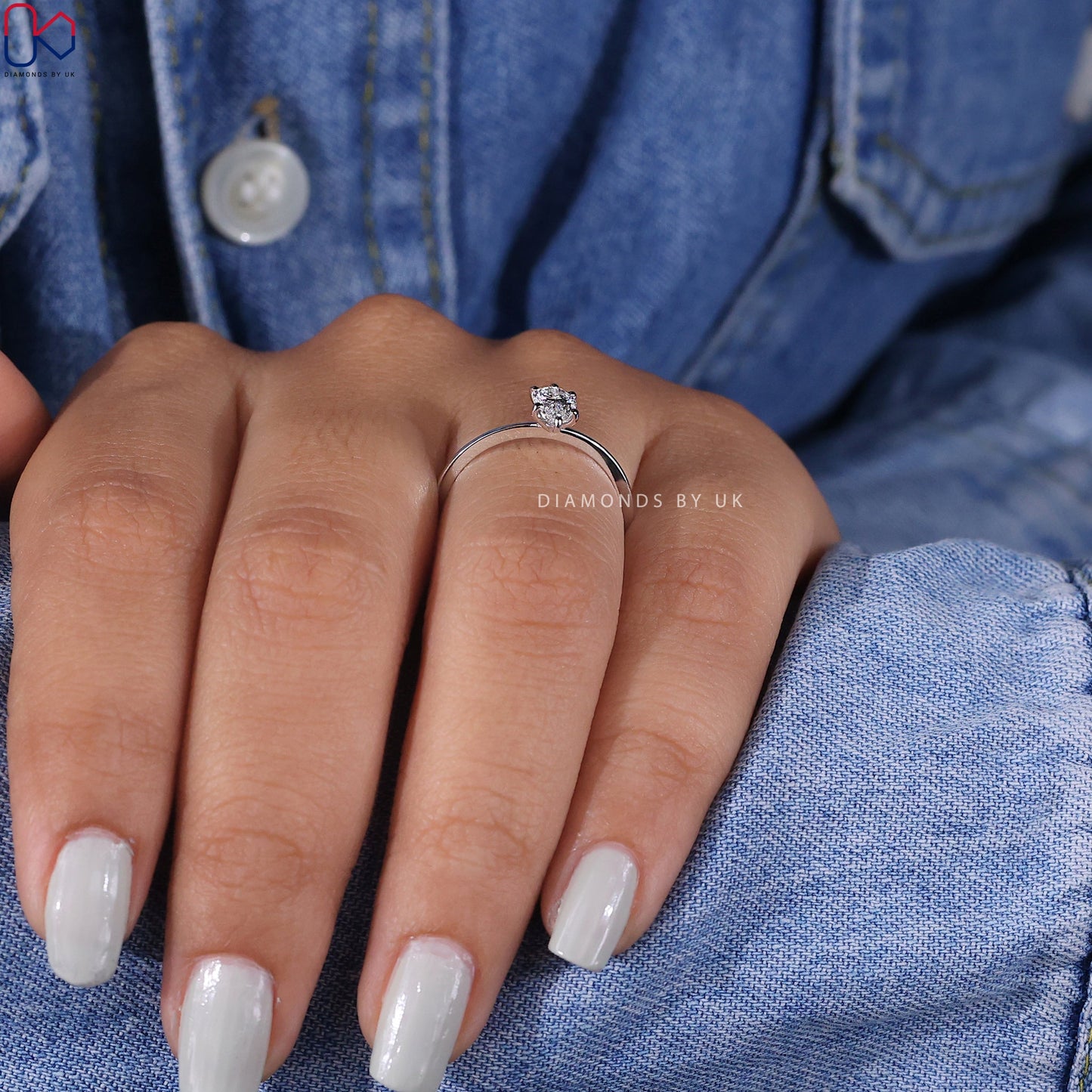 Solitaire Pear Shaped Diamond Ring In White Gold