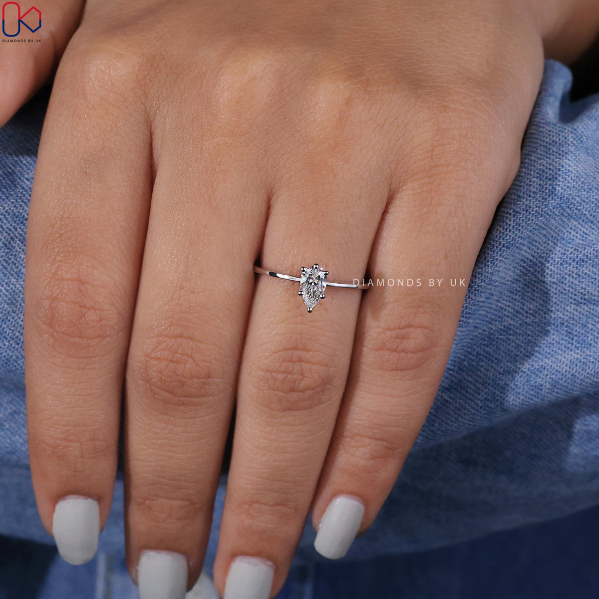 Solitaire Pear Shaped Diamond Ring In White Gold