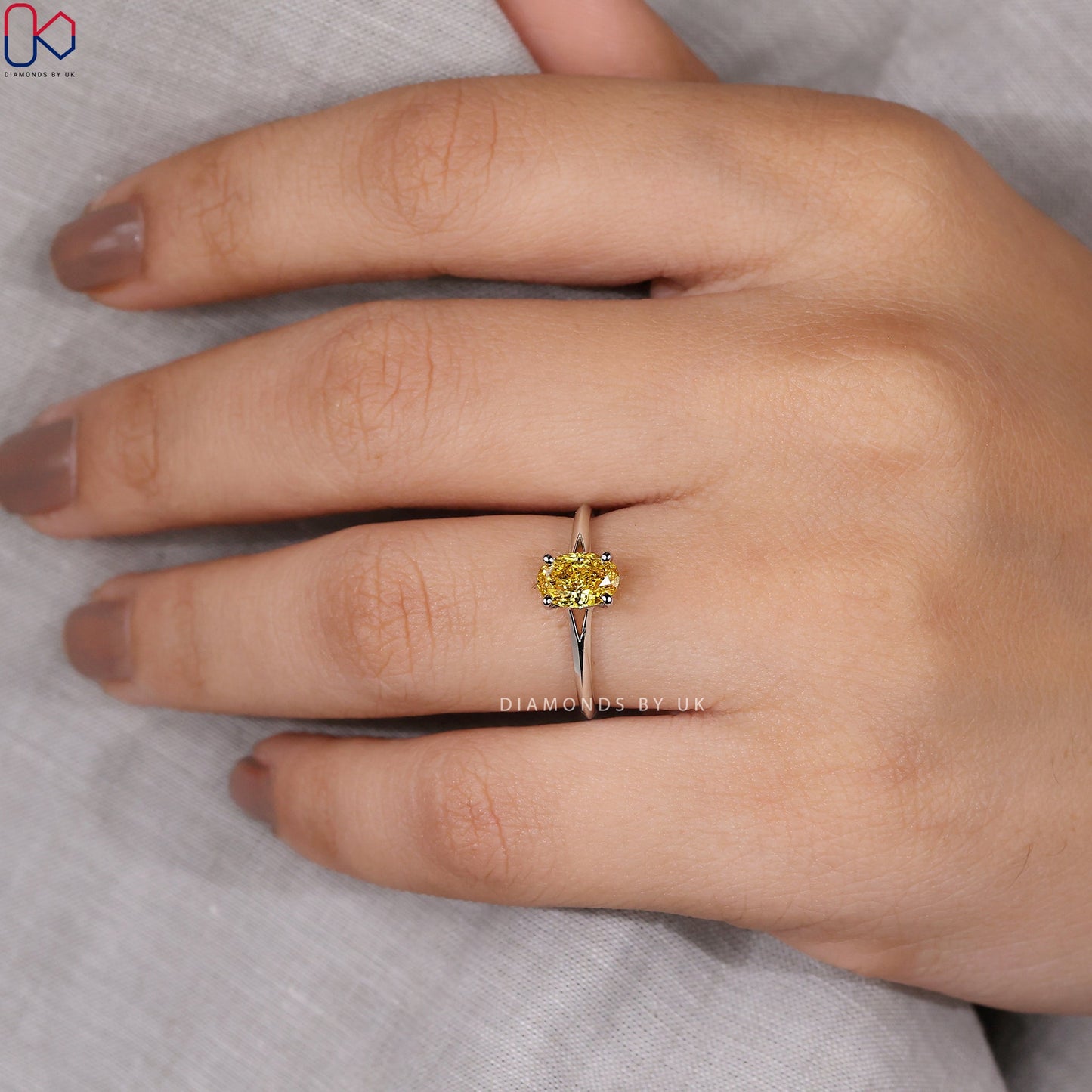 Oval Cut Yellow Diamond Engagement Ring