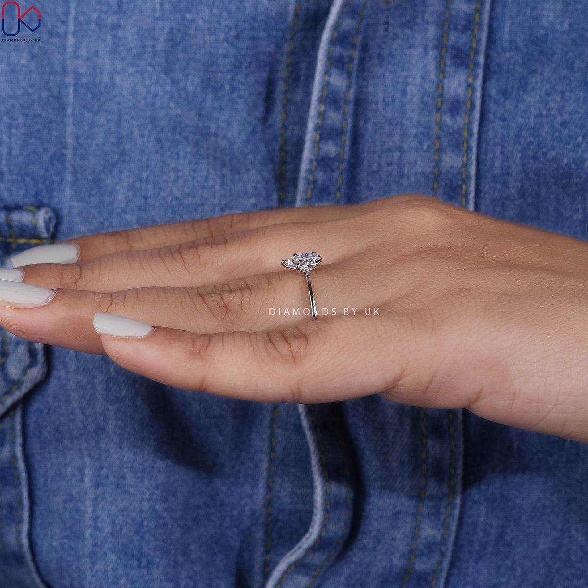 Solitaire Pear Shaped Diamond Ring In White Gold
