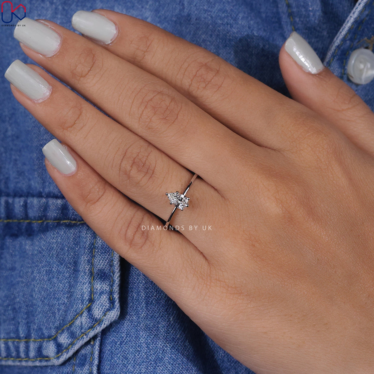 Solitaire Pear Shaped Diamond Ring In White Gold