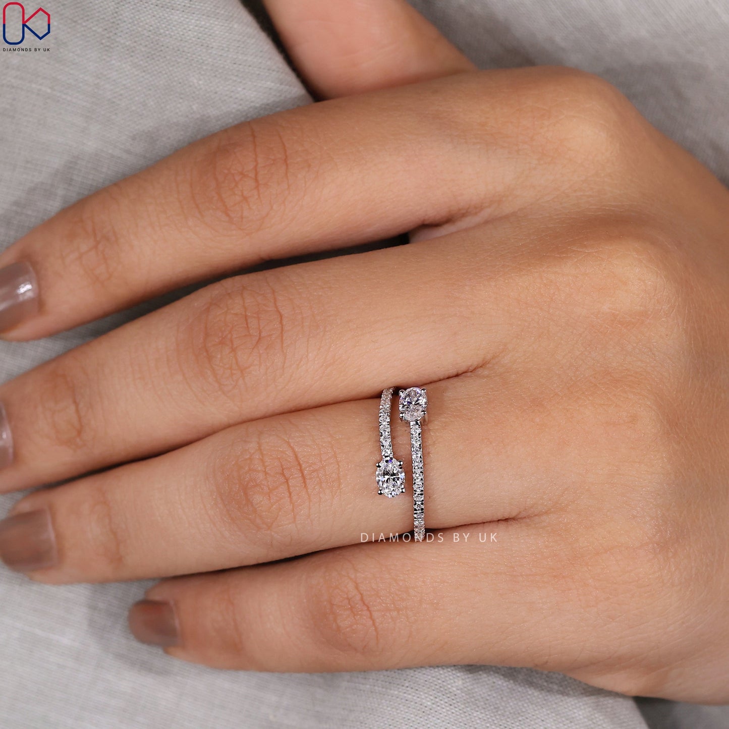 Oval Diamond Ring In Bypass Setting