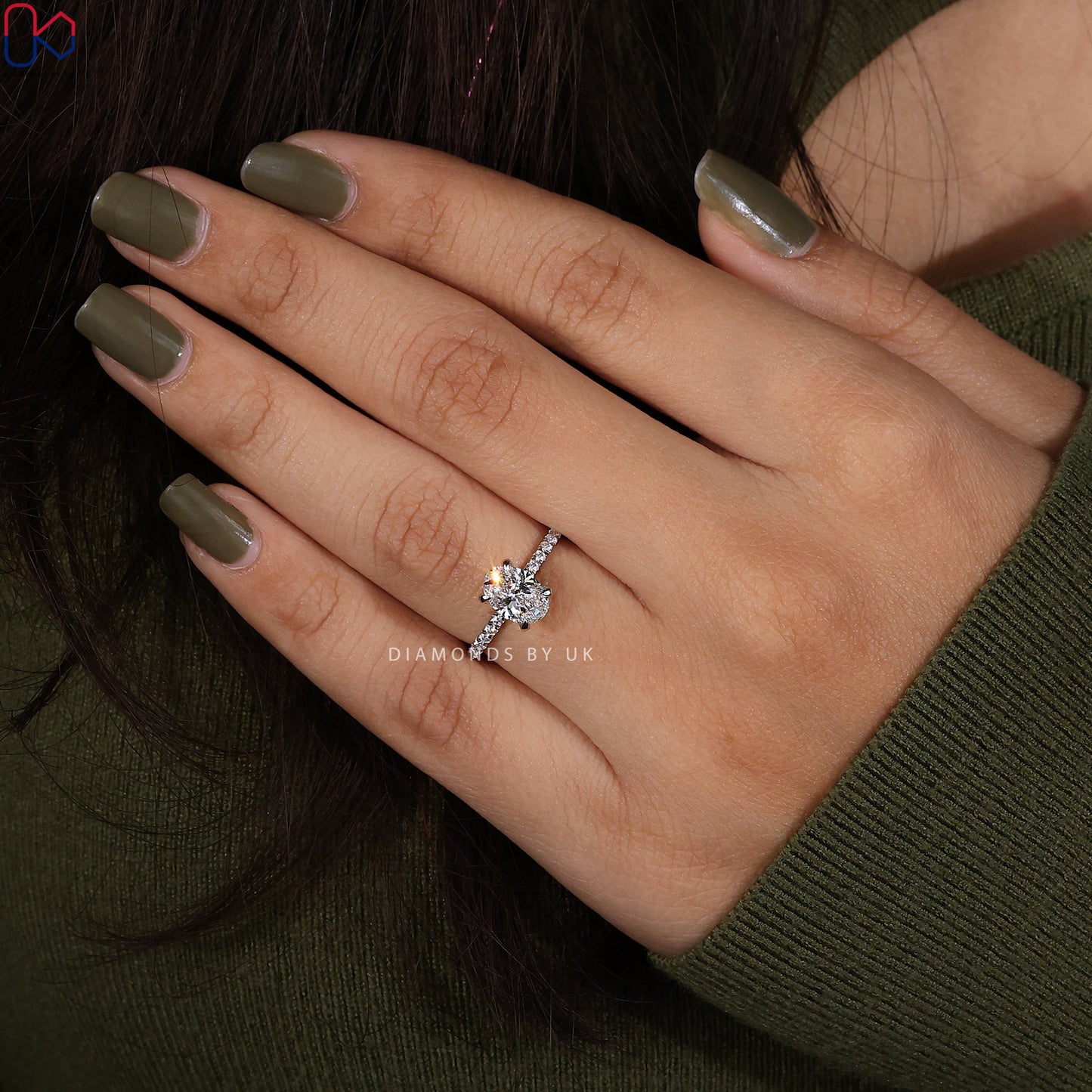 Oval Shaped Engagement Ring With Pave Setting