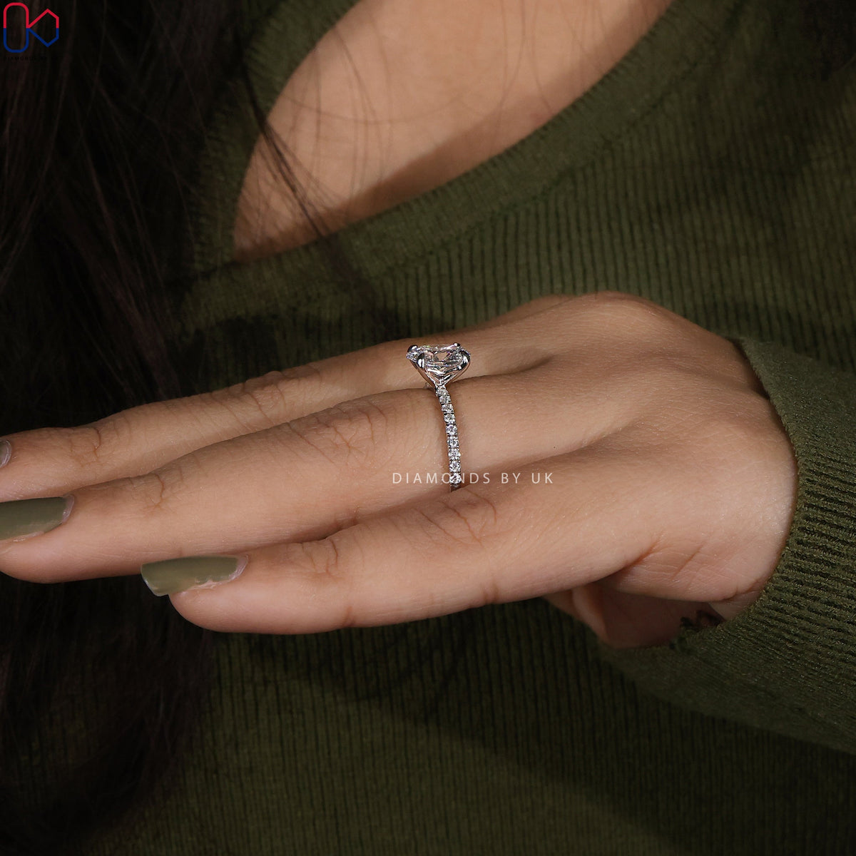 Oval Shaped Engagement Ring With Pave Setting