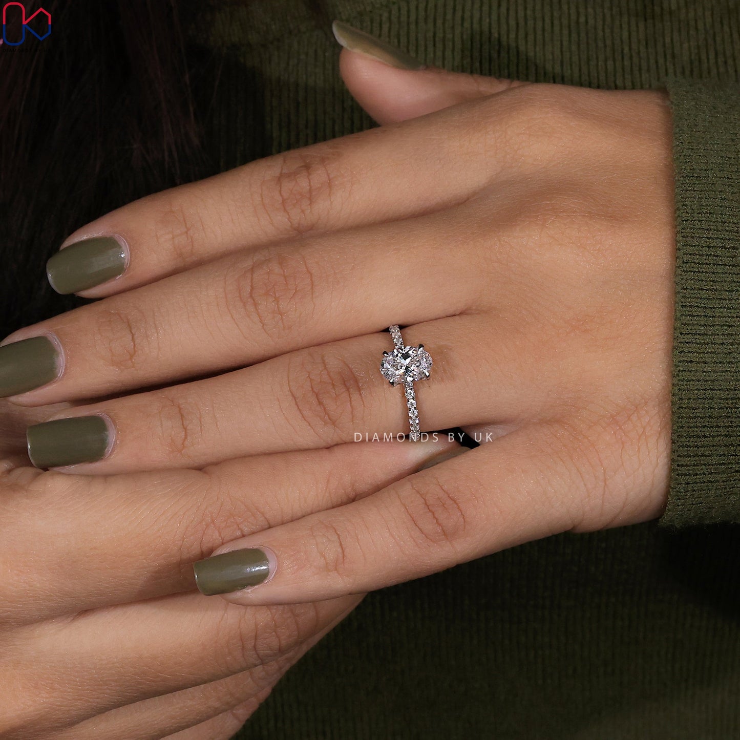 Oval Shaped Engagement Ring With Pave Setting